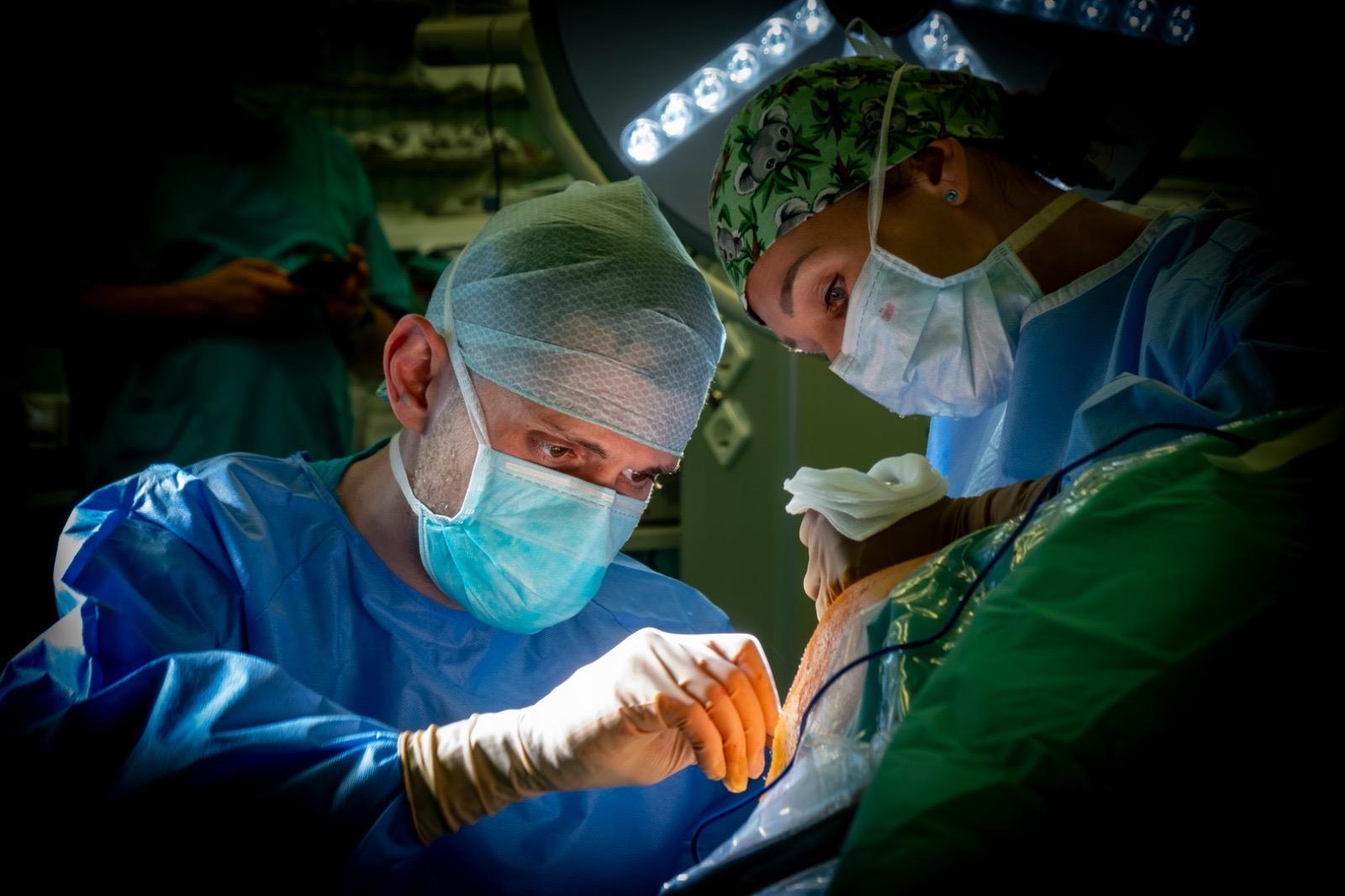 Dr. Daniel Albu performing arthroscopic surgery
